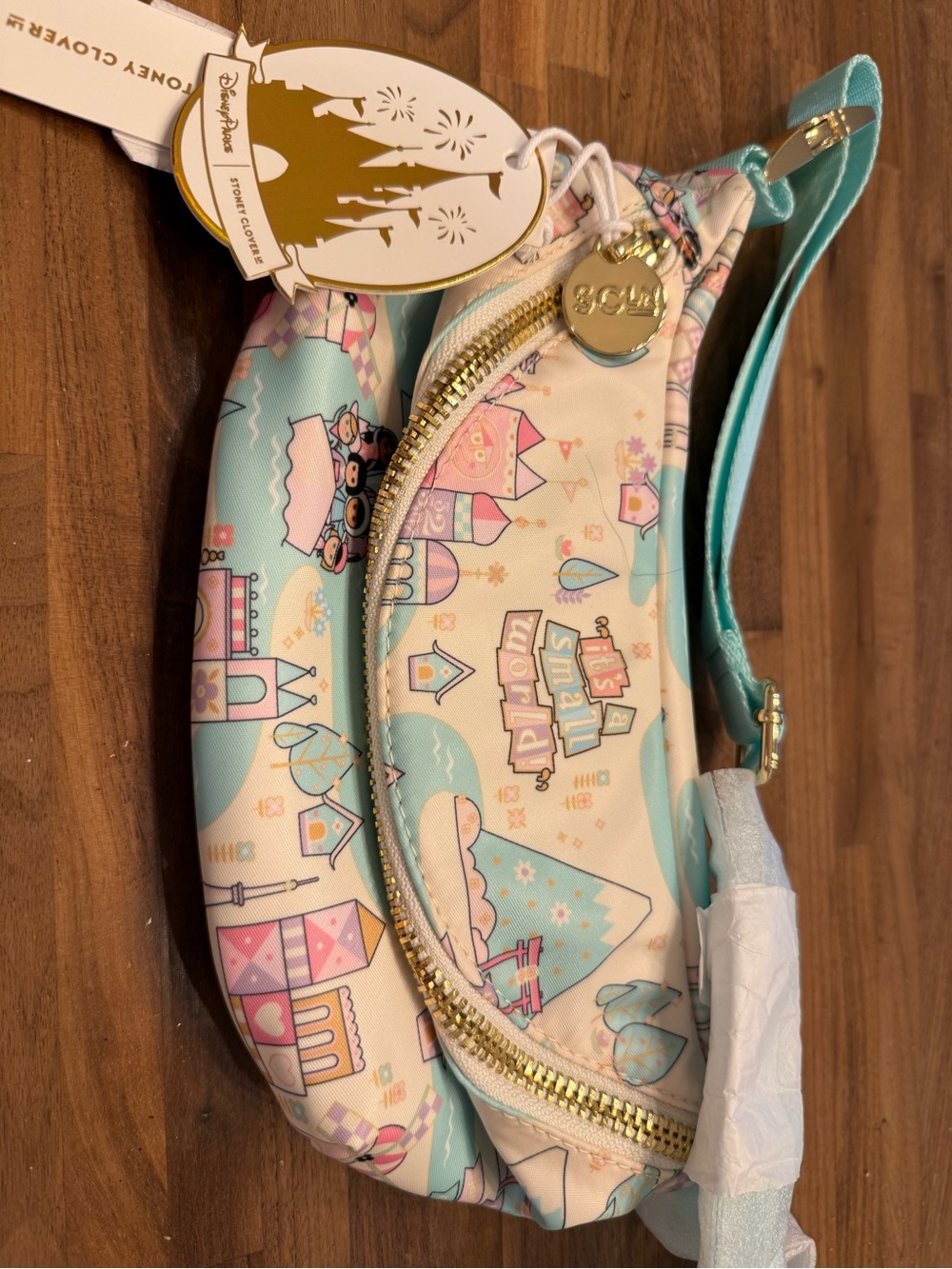 Disney pastel teal and cream kids crossbody bag with gold accents